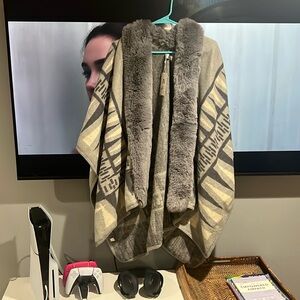 Brand new faux fur poncho